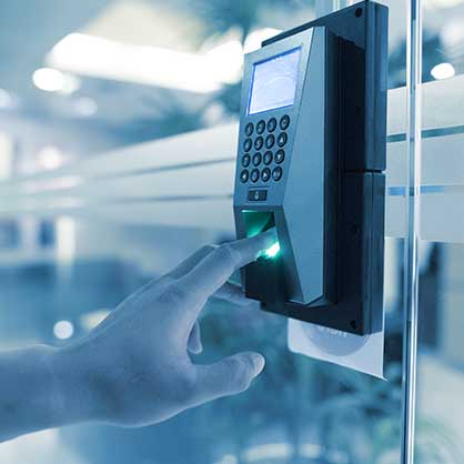 Person scans fingerprint for access